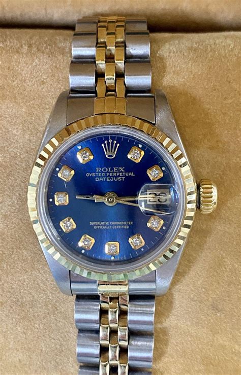 rolex blue face with diamonds.